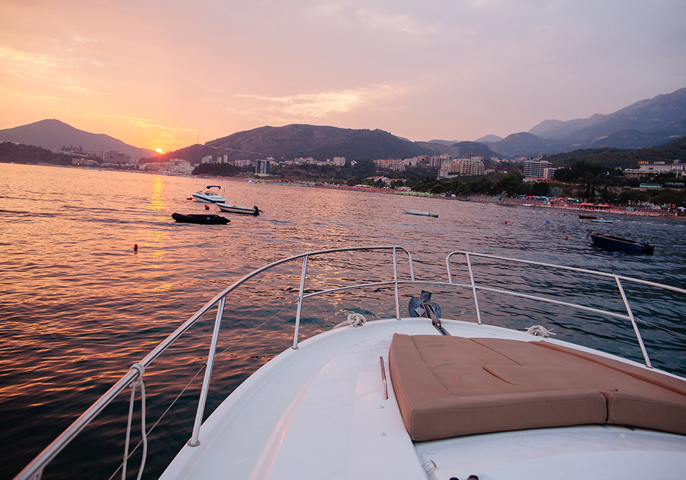 Luxury yacht sailing at sunset in the bay of Portofino